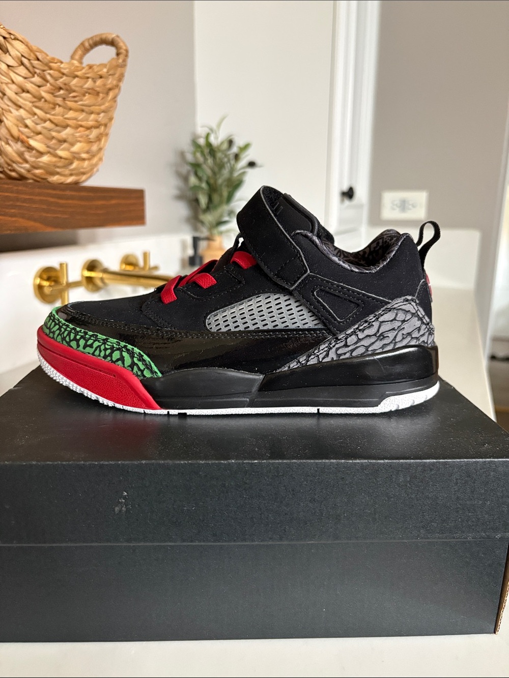 Jordan Kids Black Sneakers with Red and Green Accents
